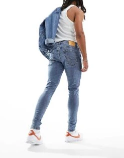 Jack & Jones Pete Tapered Jeans In Mid Blue For Men