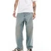 Jack & Jones Ron Skater Jean In Blue Cast Wash For Men Mid Blue Tinted